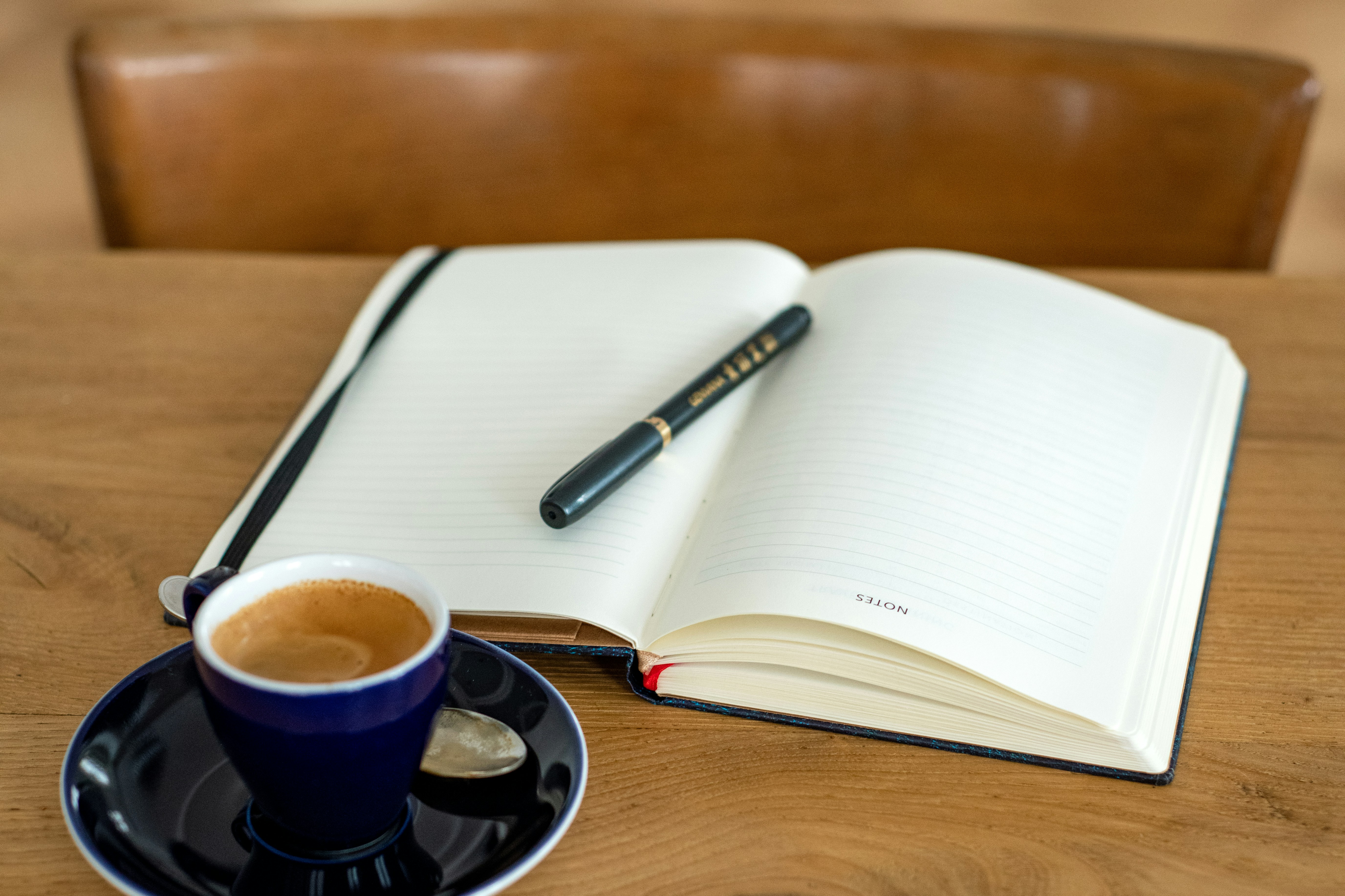 Notebook and coffee